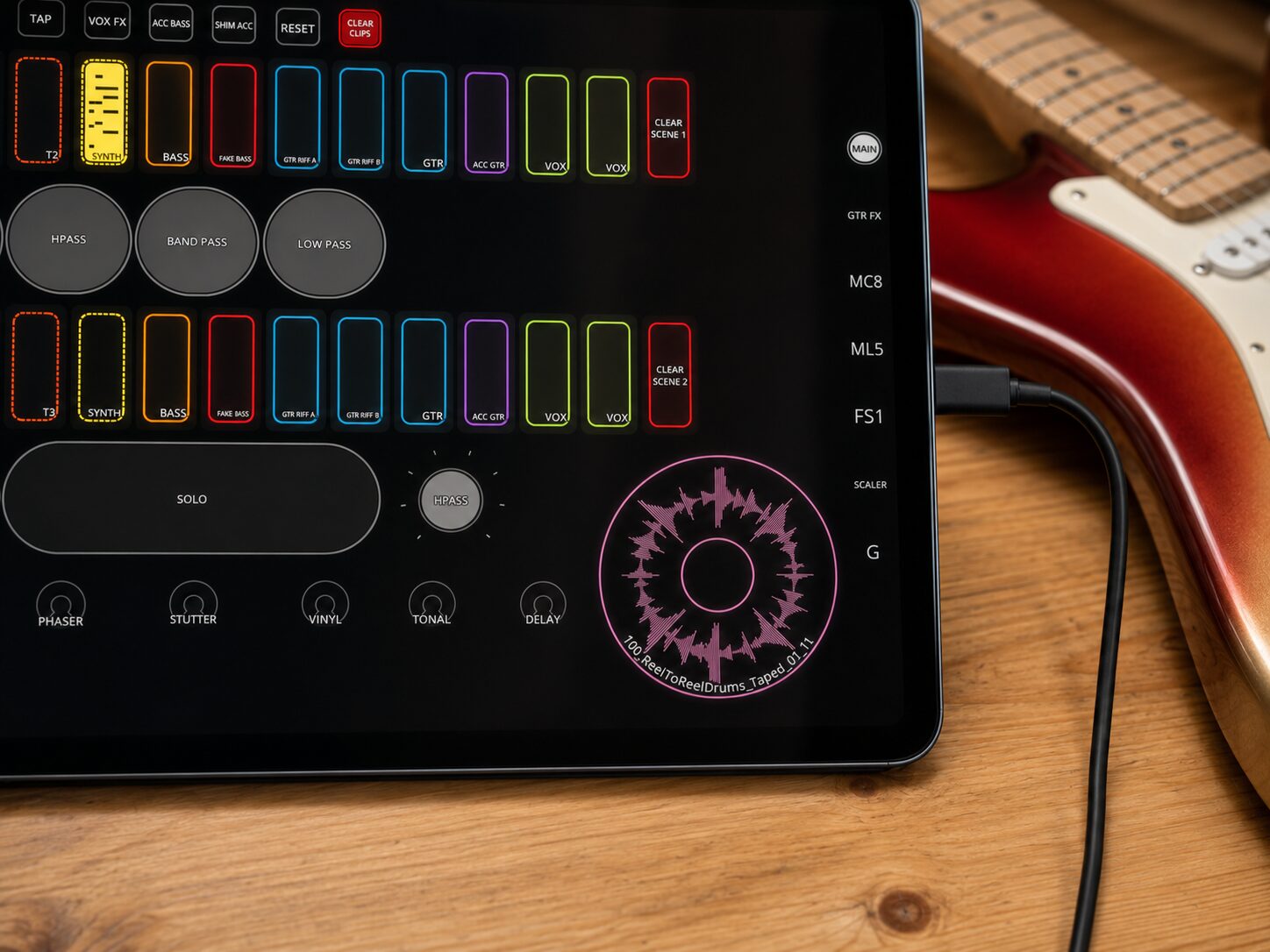 Jack Skuse's custom Loopy Pro canvas on an iPad beside an electric guitar