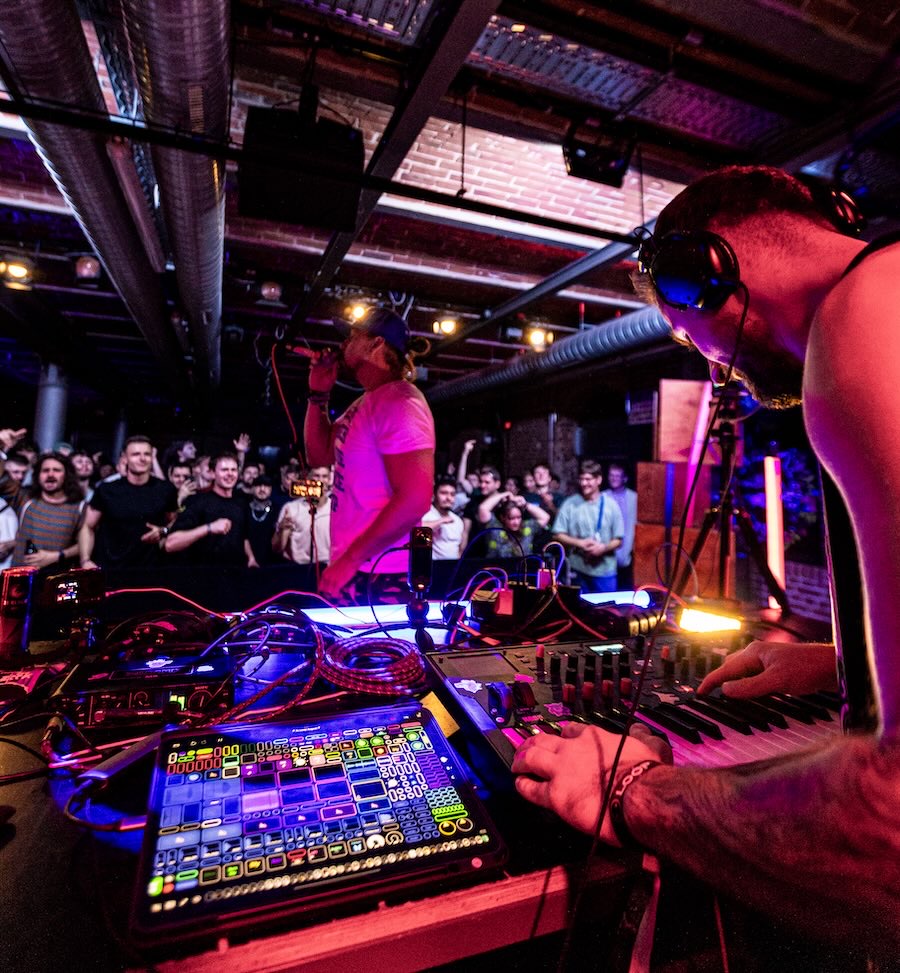 Kristóf performing on stage with a compact Loopy Pro rig